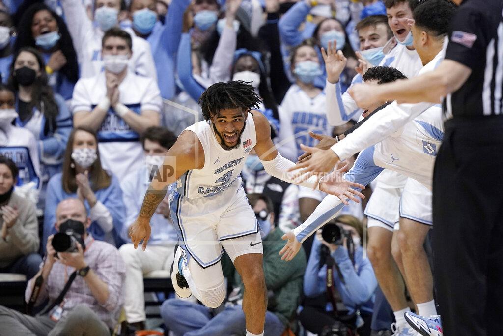 Gerry Broome North Carolina guard R.J. Davis (4) reacts following his basket against North Carolina State during the second half of an NCAA college basketball game in Chapel Hill, N.C., Saturday, Jan. 29, 2022. (AP Photo/Gerry Broome)