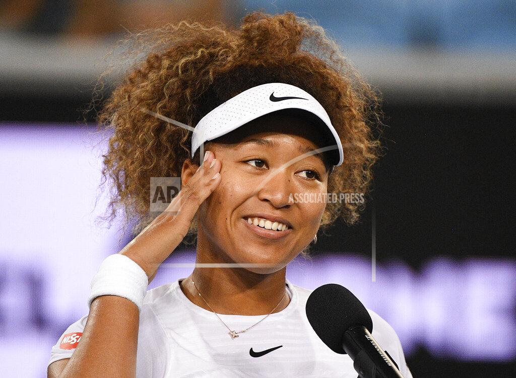 Andy Brownbill Japan's Naomi Osaka is interviewed after defeating Romania's Irina-Camelia Begu at a tuneup event ahead of the Australian Open tennis championships in Melbourne, Australia, Friday, Feb. 5, 2021.(AP Photo/Andy Brownbill)