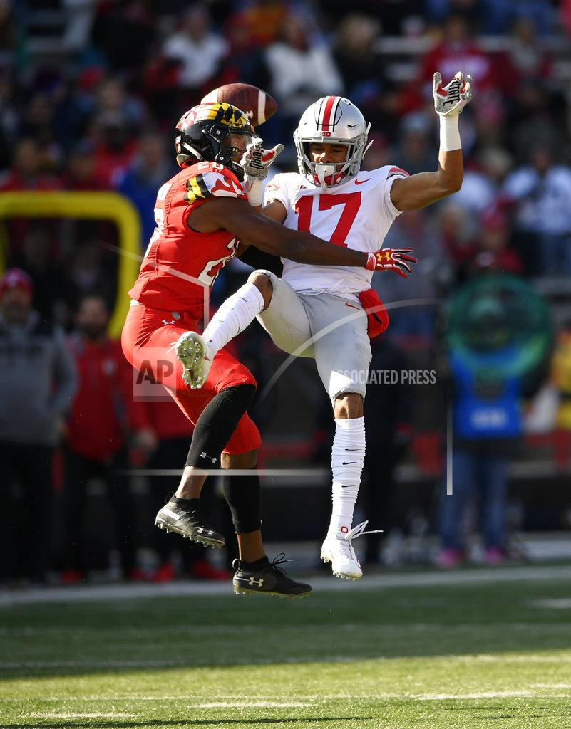 Nick Wass Maryland defensive back Antwaine Richardson, left breaks up a pass intended for Ohio State wide receiver Chris Olave (17) during the first half of an NCAA football game, Saturday, Nov. 17, 2018, in College Park, Md. (AP Photo/Nick Wass)