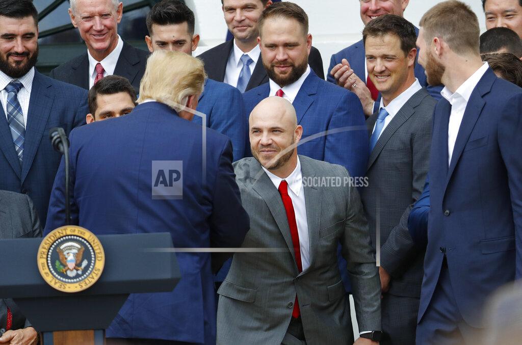 Pablo Martinez Monsivais President Donald Trump, left, shakes hands with Steve Pearce, center, during a ceremony on the South Lawn of the White House in Washington, Thursday, May 9, 2019, where he honored the 2018 World Series Baseball Champion Boston Red Sox.(AP Photo/Pablo Martinez Monsivais)