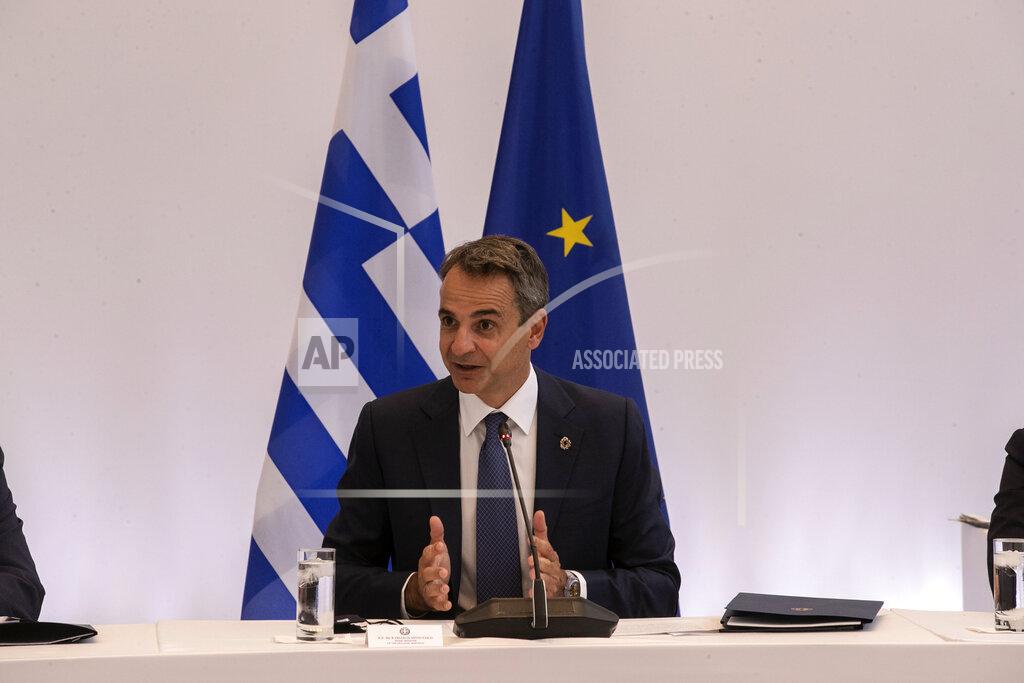Yorgos Karahalis Greek Prime Minister Kyriakos Mitsotakis speaks during a meeting in Athens, on Wednesday, July 28, 2021. Greece is hosting a one-day trilateral meeting of the three leaders. (AP Photo/Yorgos Karahalis)