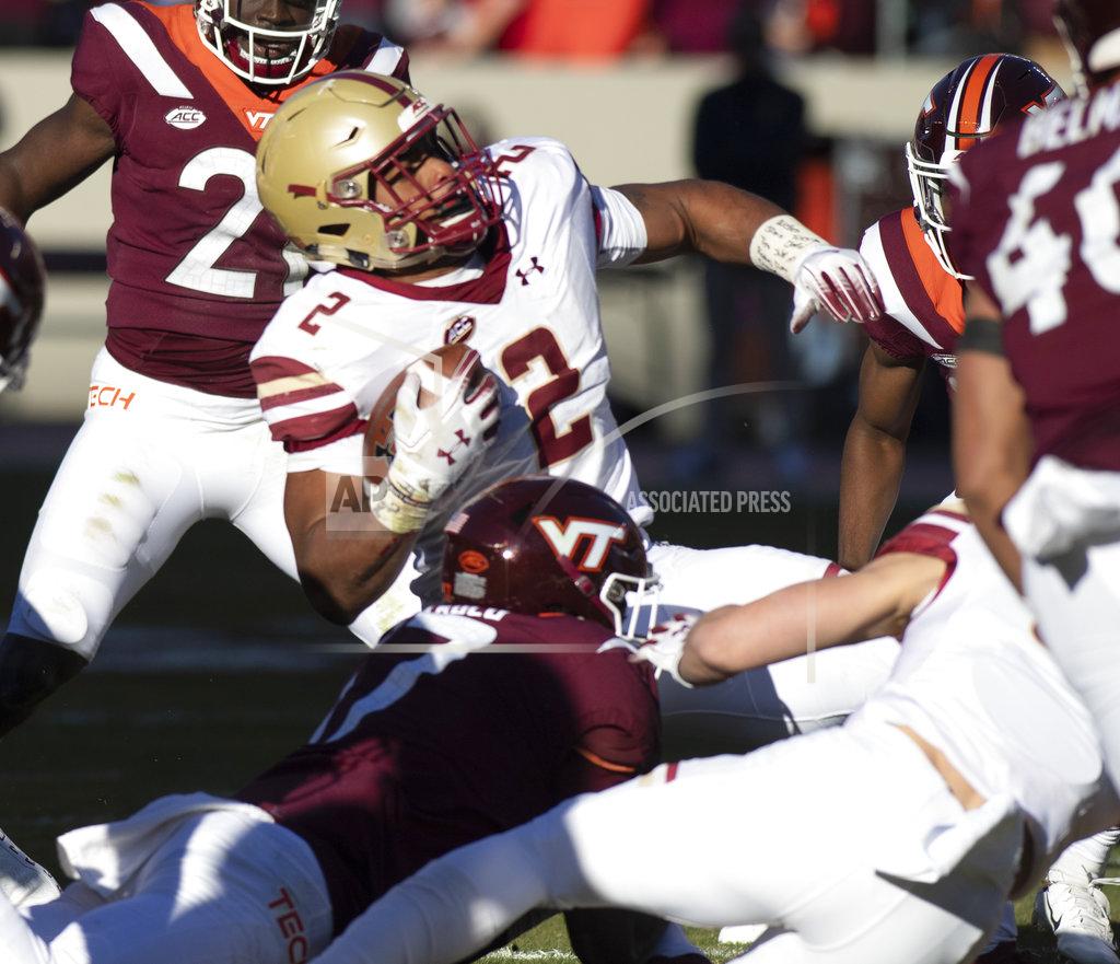 Matt Bell Boston College running back AJ Dillion is brought down during the first half of an NCAA college football game against Virginia Tech in Blacksburg, Va., Saturday, Nov. 3, 2018. (AP Photo/Matt Bell)