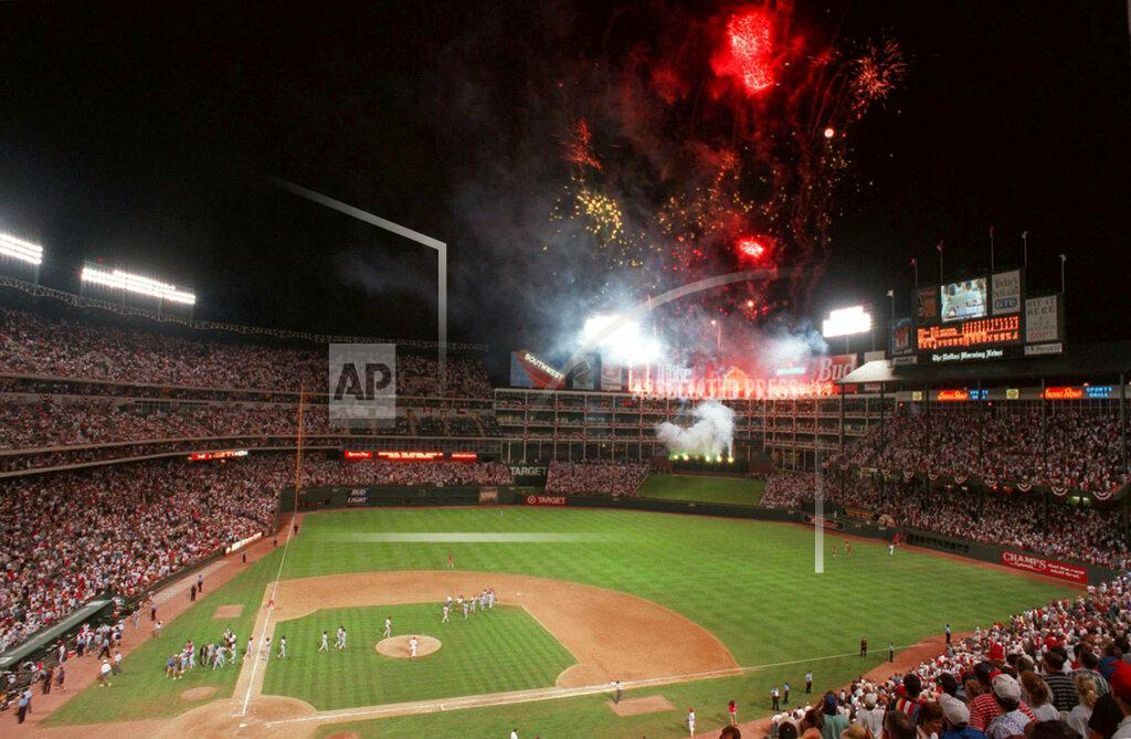 Pat Sulllivan FILE - In this July 11, 1995, file photo, the National League celebrates with fireworks following Tuesday night's All-Star Game at The Ballpark in Arlington in Arlington, Texas. Before moving across the street next season into a $1 billion-plus air-conditioned stadium with a retractable roof, the Rangers have three games this week against the Boston Red Sox and then end the season with three games against the AL East champion New York Yankees. (AP Photo/Pat Sullivan, File)