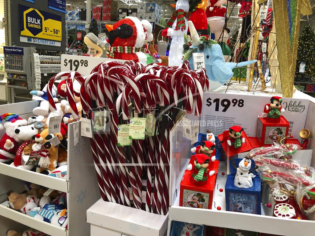 David Zalubowski Candy canes and music boxes stand on a holiday display in a Lowe's store Friday, Oct. 2, 2020, in Northglenn, Colo. Add last-minute holiday shopping to the list of time-honored traditions being upended by the coronavirus pandemic. Retailers are kicking off the holiday season earlier than ever this year in hopes of avoiding big in-store crowds and shipping bottlenecks in November and December. (AP Photo/David Zalubowski)