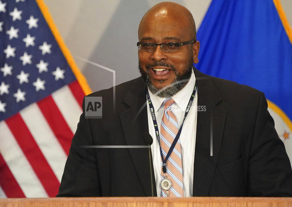 Minnesota Department of Revenue Commissioner Robert Doty answered a question from a reporter during a press conference to debut the state budget plan for the next two years Tuesday, Jan. 26, 2021 at the Department of Revenue building in St. Paul, Minn. (Anthony Souffle/Star Tribune via AP)