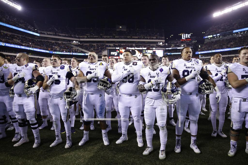 Matt Rourke Navy Midshipmen stand for their song after an NCAA college football game against Army, Saturday, Dec. 8, 2018, in Philadelphia. Army won 17 -10. (AP Photo/Matt Rourke)