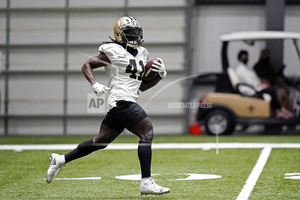 New Orleans Saints running back Alvin Kamara (41) runs through drills during practice at their NFL football training facility in Metairie, La., Wednesday, Sept. 2, 2020. (AP Photo/Gerald Herbert, Pool)