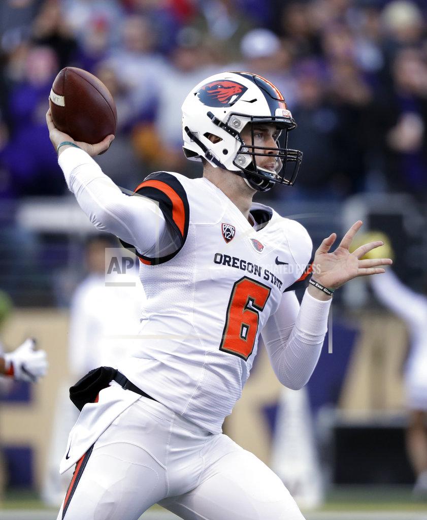 Elaine Thompson Oregon State quarterback Jake Luton passes against Washington in the first half of an NCAA college football game Saturday, Nov. 17, 2018, in Seattle. (AP Photo/Elaine Thompson)