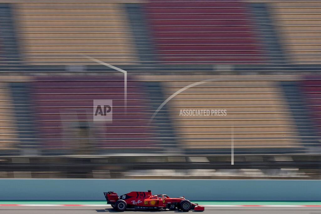 Joan Monfort Ferrari driver Sebastian Vettel of Germany drives during a Formula One pre-season testing session at the Barcelona Catalunya racetrack in Montmelo, outside Barcelona, Spain, Friday, March 1, 2019. (AP Photo/Joan Monfort)