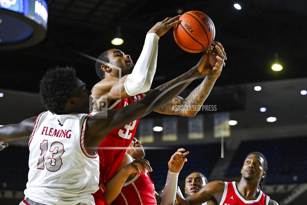 Terrance Williams Saint Joseph's forward Rasheer Fleming (13) and Houston forward Reggie Chaney compete for a rebound during the second half of an NCAA college basketball game at the Veterans Classic, Friday, Nov. 11, 2022, in Annapolis, Md. (AP Photo/Terrance Williams)