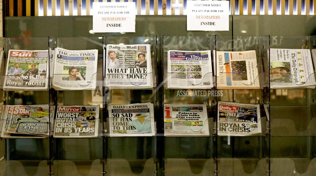 Frank Augstein Newspapers headlining Prince Harry and Meghan’s explosive TV interview are displayed for sale outside a shop in London, Tuesday, March 9, 2021. Britain's royal family is absorbing the tremors from a sensational television interview by Prince Harry and the Duchess of Sussex, in which the couple said they encountered racist attitudes and a lack of support that drove Meghan to thoughts of suicide. (AP Photo/Frank Augstein)
