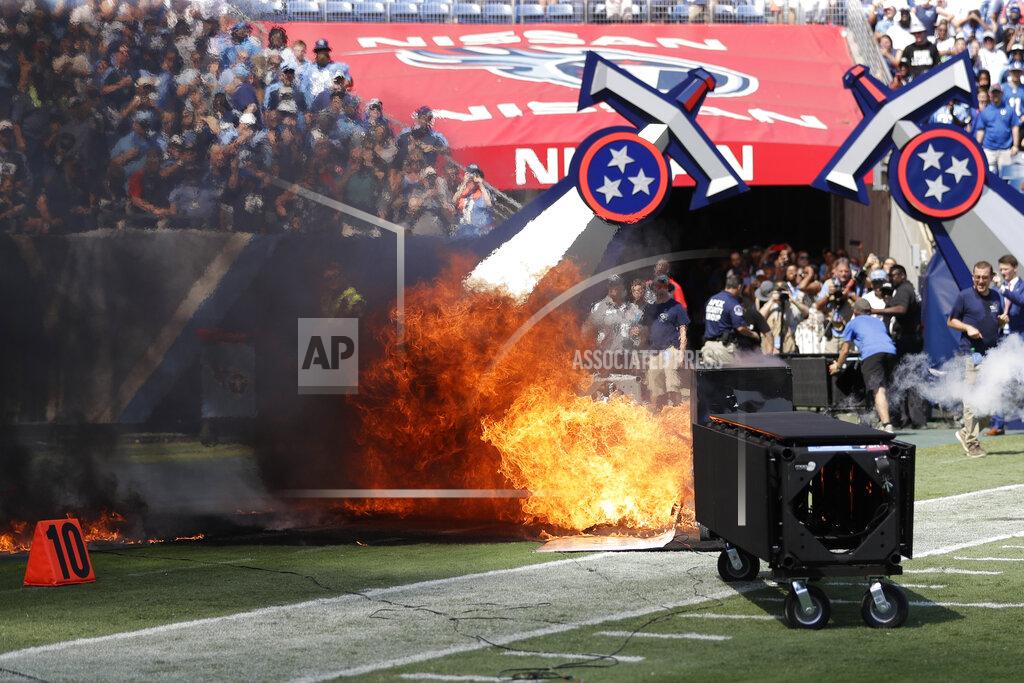 James Kenney A fire from a pyrotechnics machine burns on the field before an NFL football game between the Tennessee Titans and the Indianapolis Colts Sunday, Sept. 15, 2019, in Nashville, Tenn. (AP Photo/James Kenney)