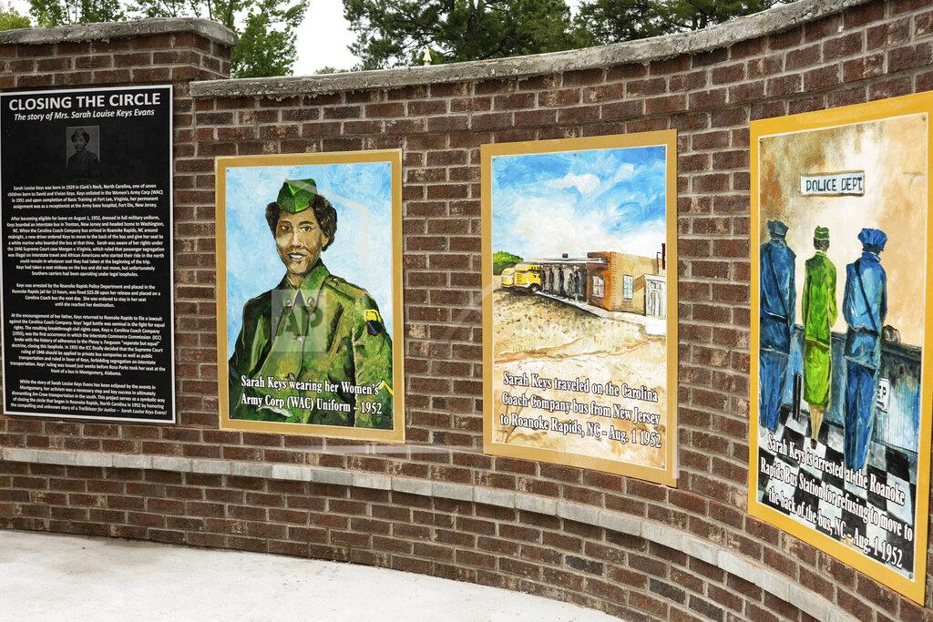 This photo provided by shows a mural forSarah Keys Evans on Saturday, Aug. 1, 2020 in Roanoke Rapids, N.C. Evans, whose refusal to go to the back of a bus in 1952 sparked a change in law is being honored with a plaza bearing her name and murals depicting her arrest. (Les Atkins via AP)