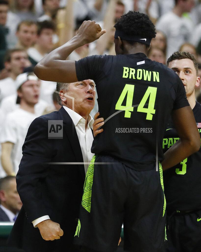 Carlos Osorio Michigan State head coach Tom Izzo, left, yells at forward Gabe Brown after a dunk during the second half of an NCAA college basketball game against Wisconsin, Friday, Jan. 17, 2020, in East Lansing, Mich. (AP Photo/Carlos Osorio)