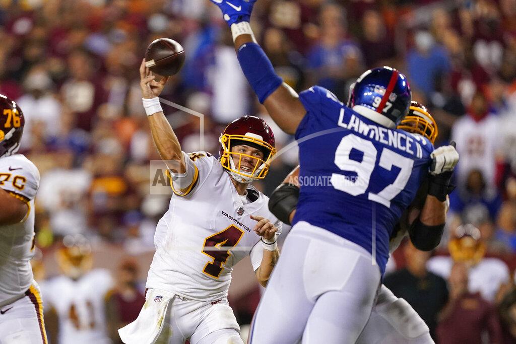 Alex Brandon Washington Football Team quarterback Taylor Heinicke (4) throws a touchdown pass to wide receiver Terry McLaurin against the New York Giants during the first half of an NFL football game, Thursday, Sept. 16, 2021, in Landover, Md. (AP Photo/Alex Brandon)