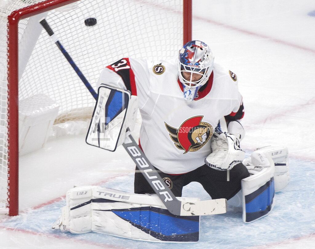 Graham Hughes Ottawa Senators goaltender Anton Forsberg is scored against by Montreal Canadiens' Tyler Toffoli during first-period NHL hockey game action in Montreal, Saturday, April 3, 2021. (Graham Hughes/The Canadian Press via AP)