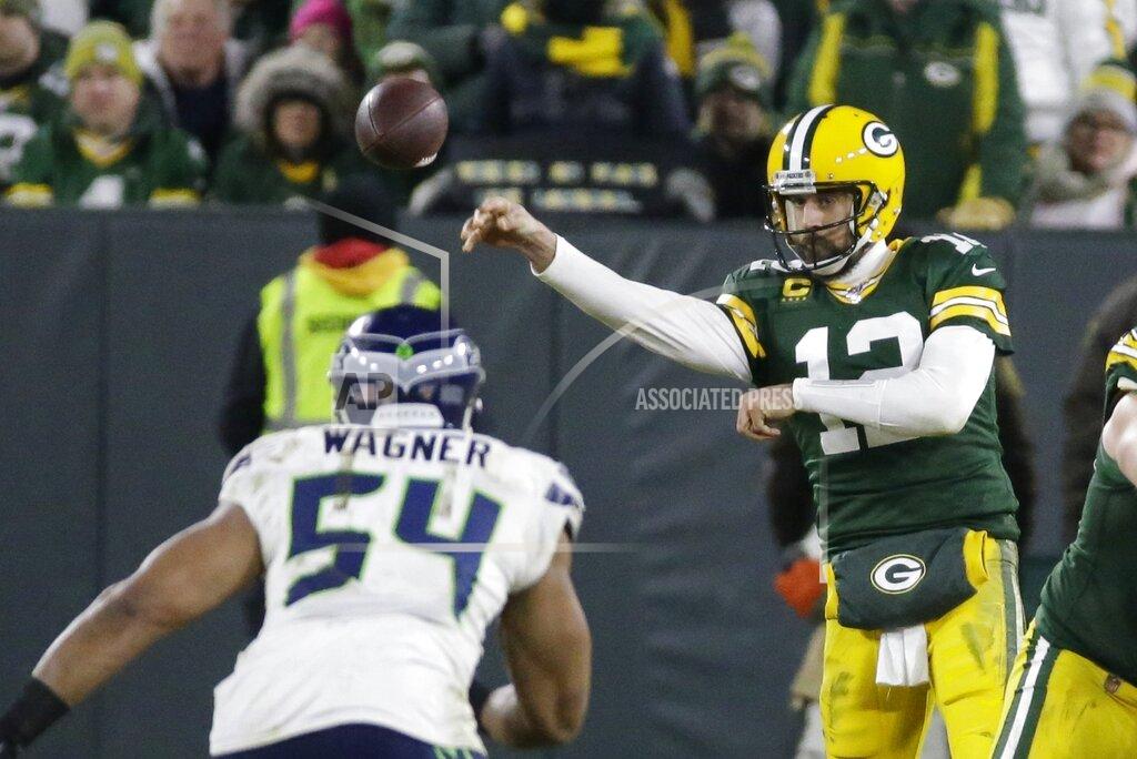 Mike Roemer Green Bay Packers' Aaron Rodgers throws during the second half of an NFL divisional playoff football game against the Seattle Seahawks Sunday, Jan. 12, 2020, in Green Bay, Wis. (AP Photo/Mike Roemer)
