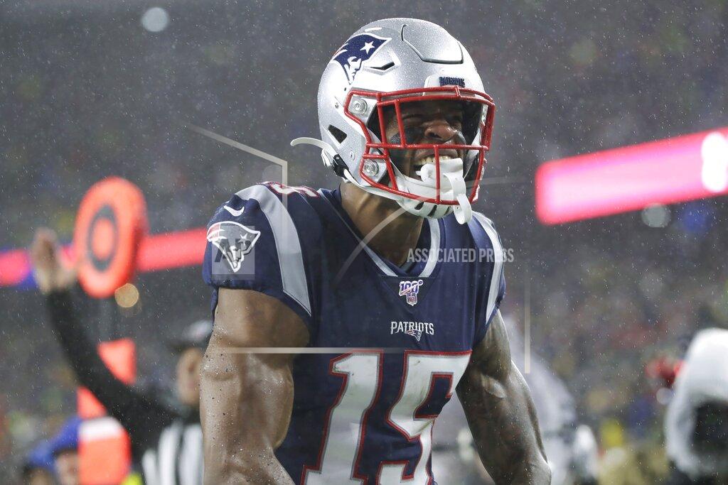 Elise Amendola New England Patriots wide receiver N'Keal Harry celebrates his touchdown catch in the end zone in the first half of an NFL football game against the Dallas Cowboys, Sunday, Nov. 24, 2019, in Foxborough, Mass. (AP Photo/Elise Amendola)