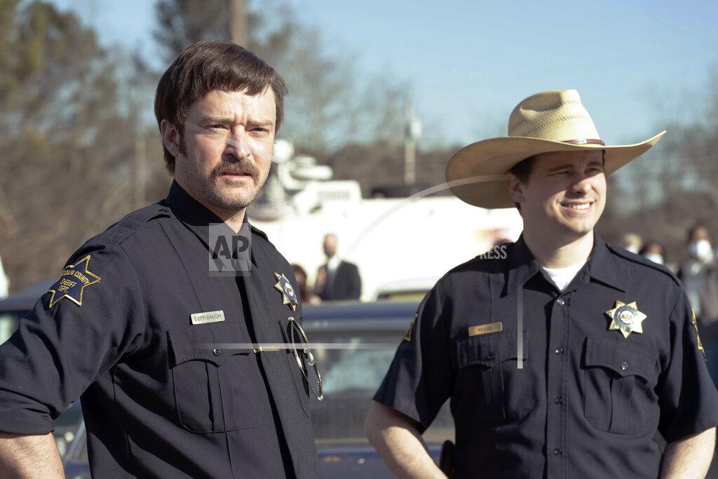 Tina Rowden This image released by Hulu shows Justin Timberlake, left, and Jason Ritter in a scene from the series "Candy." (Hulu via AP)