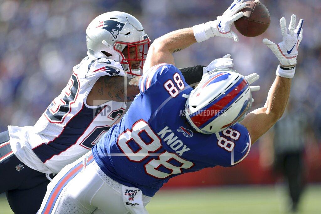 Ron Schwane Buffalo Bills tight end Dawson Knox (88) catches a pass in front of New England Patriots safety Patrick Chung in the first half of an NFL football game, Sunday, Sept. 29, 2019, in Orchard Park, N.Y. (AP Photo/Ron Schwane)