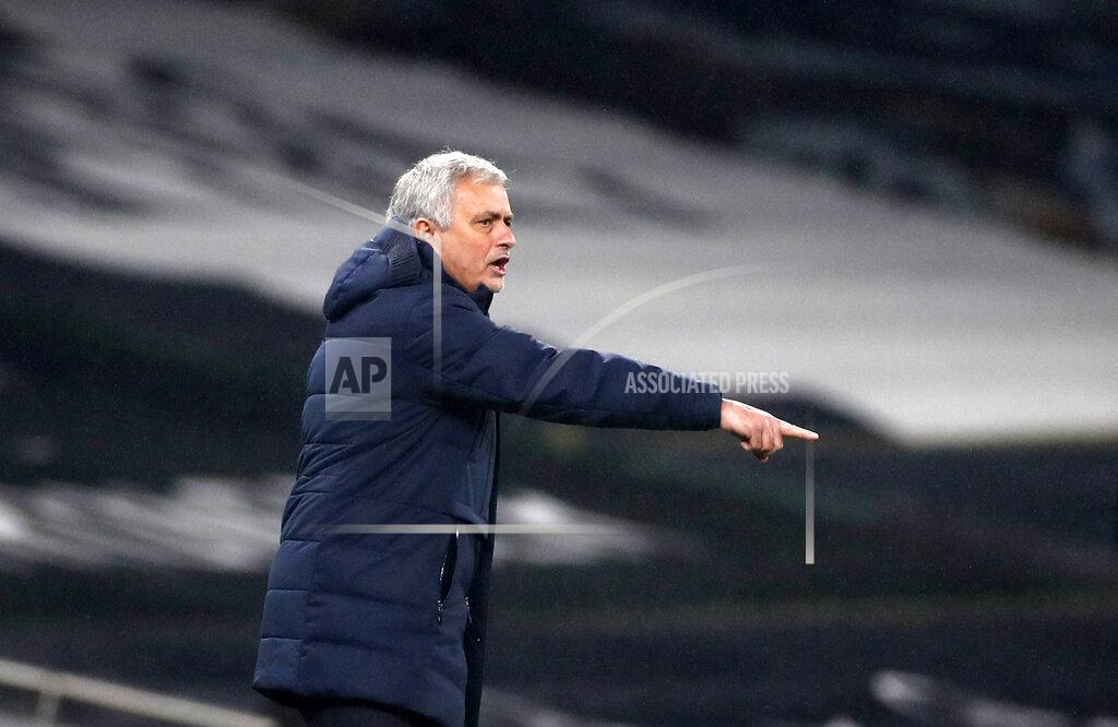 Matthew Childs Tottenham's manager Jose Mourinho gives instructions to his players during the English Premier League soccer match between Tottenham Hotspur and Fulham at the Tottenham Hotspur Stadium in London, Wednesday, Jan. 13, 2021. (Matthew Childs/Pool via AP)