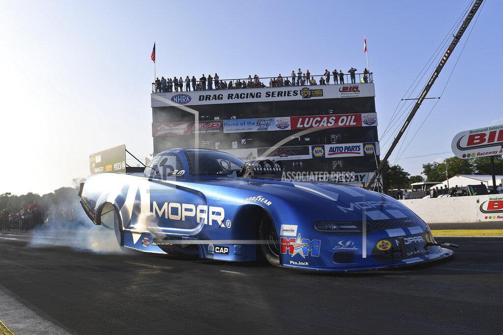 Marc Gewertz In this photo provided by the NHRA, Matt Hagan drives in Funny Car qualifying Friday, Aug. 16, 2019, at the Lucas Oil NHRA Nationals drag races at Brainerd International Raceway in Brainerd, Minn. Hagan's best run was a 3.890-second pass at 328.46 mph. (Marc Gewertz/NHRA via AP)