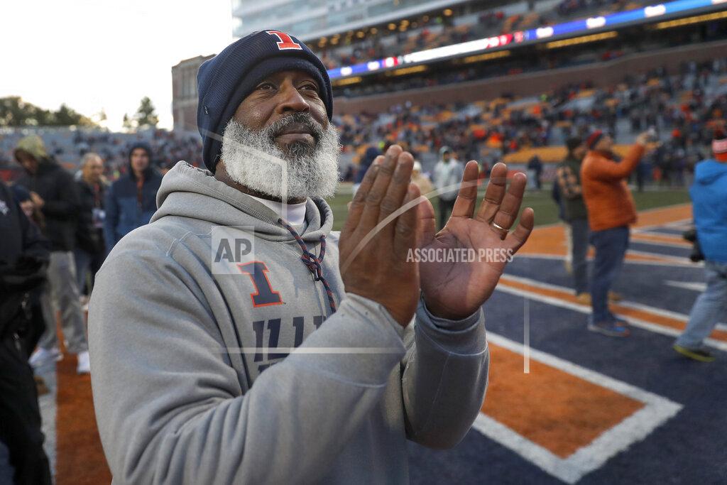 Charles Rex Arbogast Illinois head coach Lovie Smith applauds the marching band after his team's 38-10 win over Rutgers after an NCAA college football game Saturday, Nov. 2, 2019, in Champaign, Ill. (AP Photo/Charles Rex Arbogast)