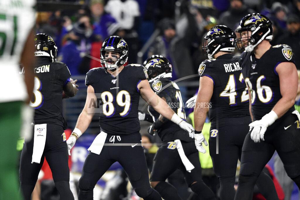 Gail Burton Baltimore Ravens tight end Mark Andrews (89) celebrates with quarterback Lamar Jackson (8) after they connected for a touchdown pass during the first half of an NFL football game against the New York Jets, Thursday, Dec. 12, 2019, in Baltimore. (AP Photo/Gail Burton)