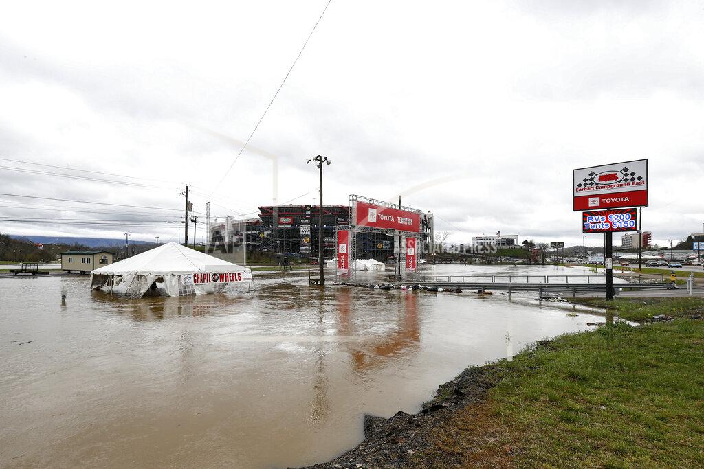 Wade Payne Water floods the vendor area as races for both the Truck Series and NASCAR Cup Series auto race were postponed due to inclement weather at Bristol Motor Speedway, Sunday, March 28, 2021, in Bristol, Tenn. (AP Photo/Wade Payne)