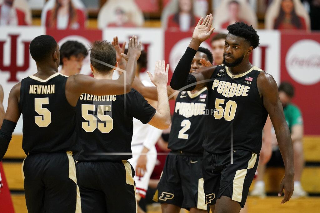 Darron Cummings Purdue's Trevion Williams (50) celebrates with Brandon Newman (5) after Williams hit a shot and was fouled during the second half of the team's NCAA college basketball game against Indiana, Thursday, Jan. 14, 2021, in Bloomington Ind. Purdue won 81-69. (AP Photo/Darron Cummings)