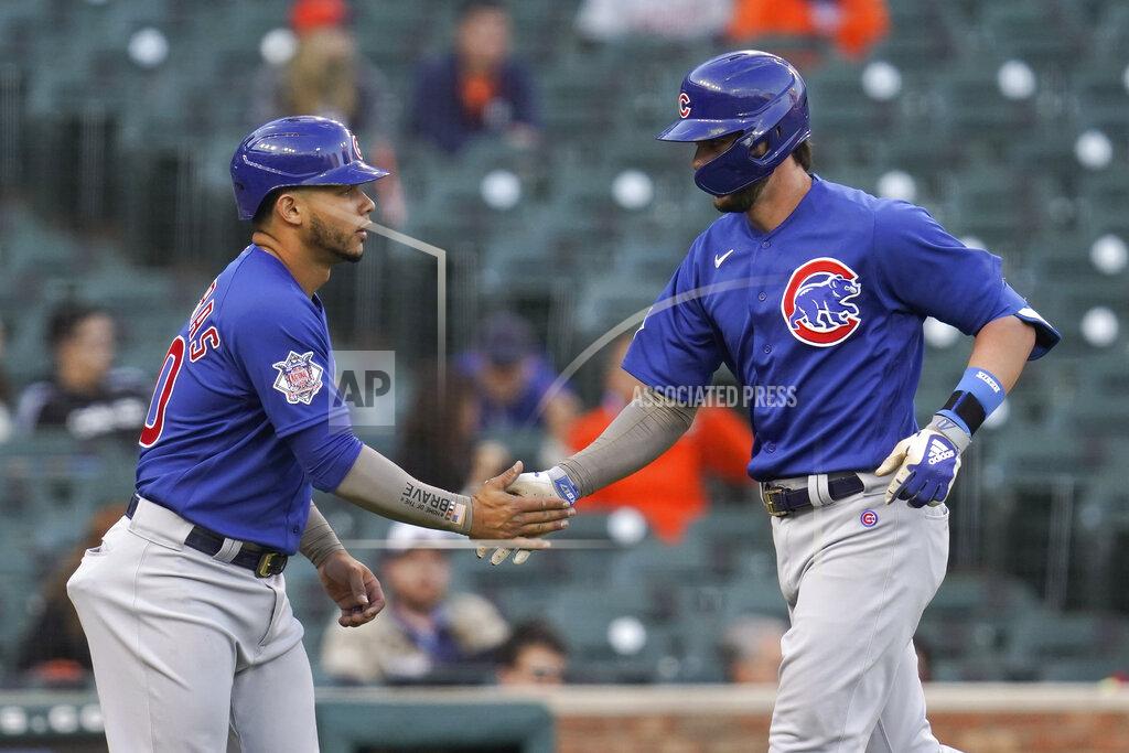 Paul Sancya Chicago Cubs' Kris Bryant, right, celebrates his two-run home run with Willson Contreras against the Detroit Tigers in the third inning of a baseball game in Detroit, Friday, May 14, 2021. (AP Photo/Paul Sancya)