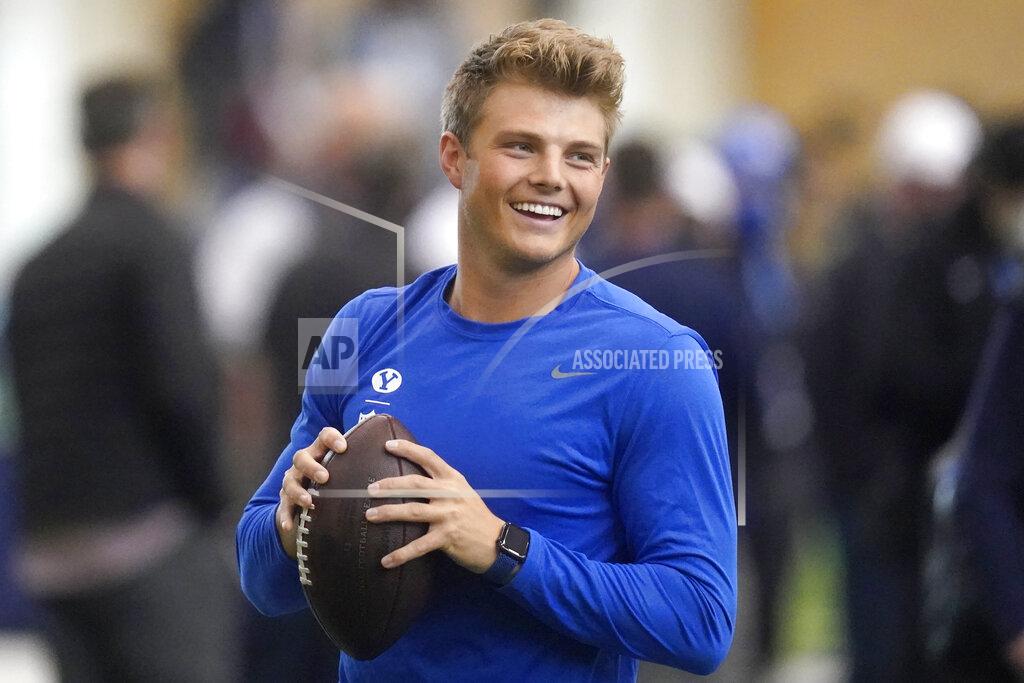 Rick Bowmer BYU quarterback Zach Wilson warms up before participating in the school's pro day football workout for NFL scouts Friday, March 26, 2021, in Provo, Utah. (AP Photo/Rick Bowmer)
