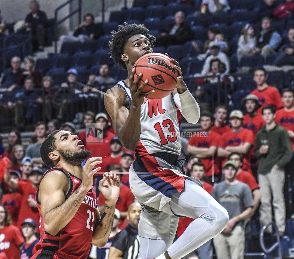 Bruce Newman Mississippi guard Bryce Williams (13) goes to the basket in front of Seattle guard Terrell Brown (23) during an NCAA college basketball game Tuesday, Nov. 19, 2019, in Oxford, Miss. (Bruce Newman/The Oxford Eagle via AP)