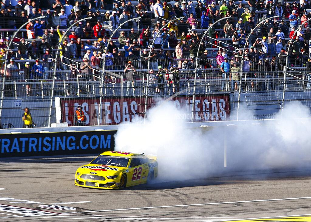 Chase Stevens Joey Logano (22) does a burnout after winning a NASCAR Cup Series auto race at Las Vegas Motor Speedway on Sunday, Feb. 23, 2020. (AP Photo/Chase Stevens)