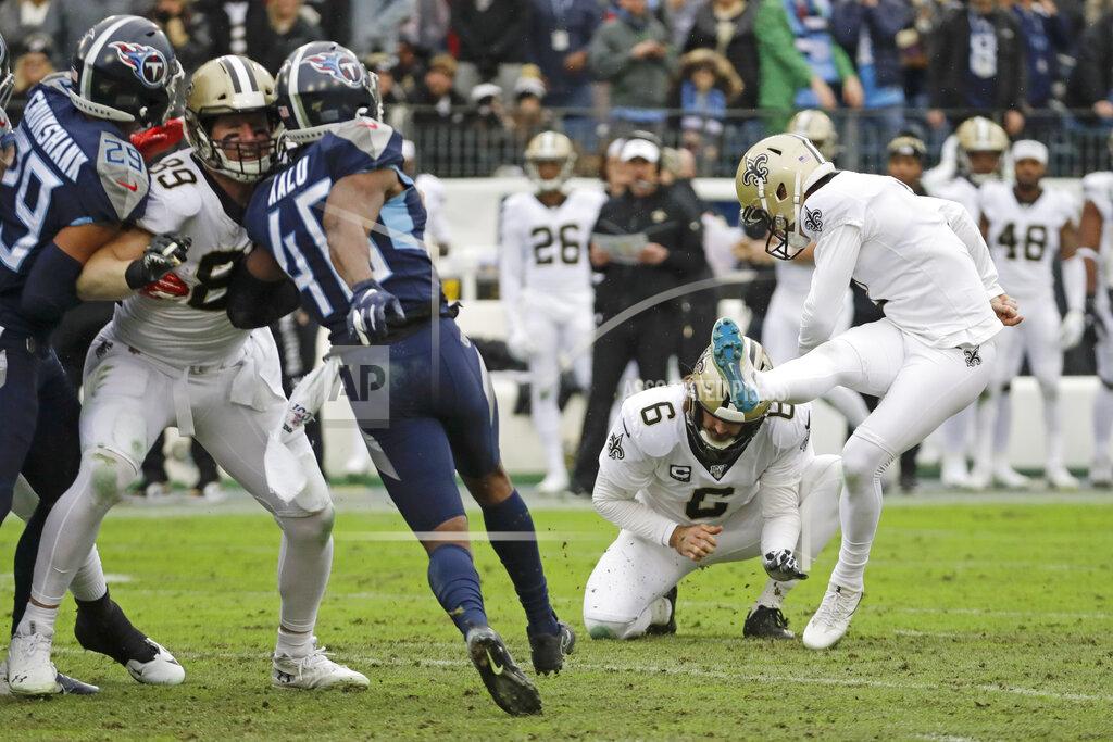 James Kenney New Orleans Saints kicker Wil Lutz, right, kicks a 47-yard field goal against the Tennessee Titans in the first half of an NFL football game Sunday, Dec. 22, 2019, in Nashville, Tenn. Holding is Thomas Morstead (6). (AP Photo/James Kenney)