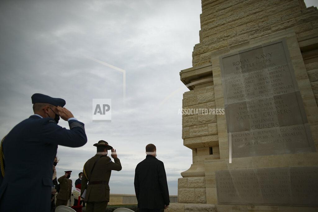 Emrah Gurel Dignitaries and military personnel attend a ceremony to commemorate soldiers who died during the World War I campaign on the Gallipoli peninsula, in Canakkale, Turkey, Saturday, April 24, 2021, a day ahead of the 106th anniversary of the Gallipoli Campaign.The Gallipoli Campaign of 1915 by Allied forces aimed to take control of the peninsula to weaken the Ottoman Empire. The campaign failed and Allied forces withdrew after eight months of fighting on the ground and some 250,000 casualties on both sides. The memorials were kept small due to the COVID-19 pandemic.(AP Photo/Emrah Gurel)
