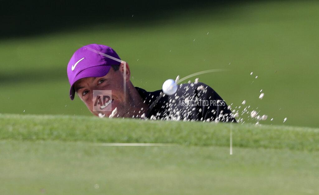 Curtis Compton Rory McIlroy hits out of the bunker to the second green during the third round of the Masters golf tournament Saturday, Nov. 14, 2020, in Augusta, Ga. (Curtis Compton/Atlanta Journal-Constitution via AP)