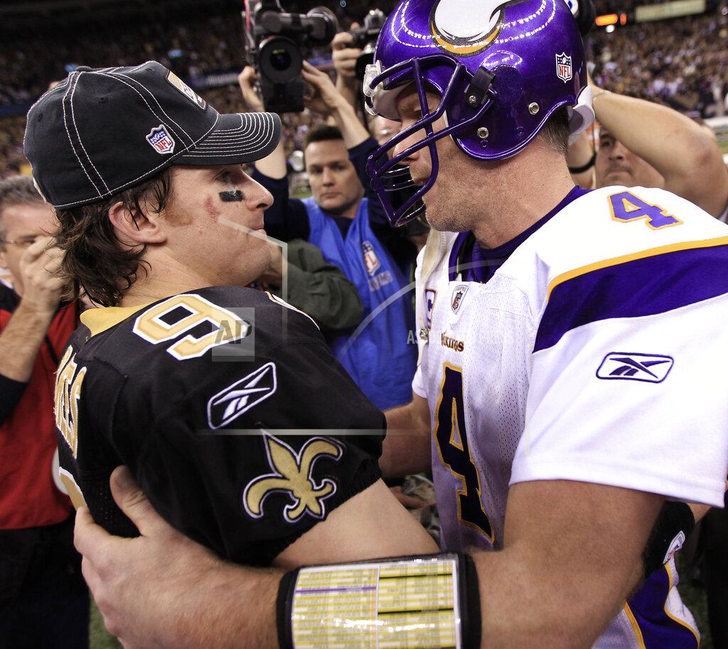David J. Phillip FILE - In this Jan. 24, 2010, file photo, Minnesota Vikings quarterback Brett Favre (4) congratulates New Orleans Saints quarterback Drew Brees (9) after overtime in the NFC Championship NFL football game in New Orleans. The Saints defeated the Vikings 31-28 to advance to the Super Bowl against the Indianapolis Colts. Brees is one of just two current Saints players who played in the NFC title game against the Vikings in January 2010. (AP Photo/David J. Phillip, File)