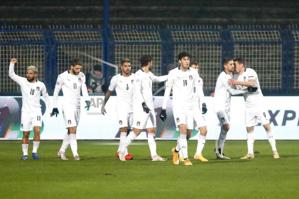 Kemal Softic Italy players celebrate after Italy's Andrea Belotti scored his side's opening goal during the UEFA Nations League soccer match between Bosnia and Italy, in Sarajevo, Bosnia, Wednesday, Nov. 18, 2020. (AP Photo/Kemal Softic)