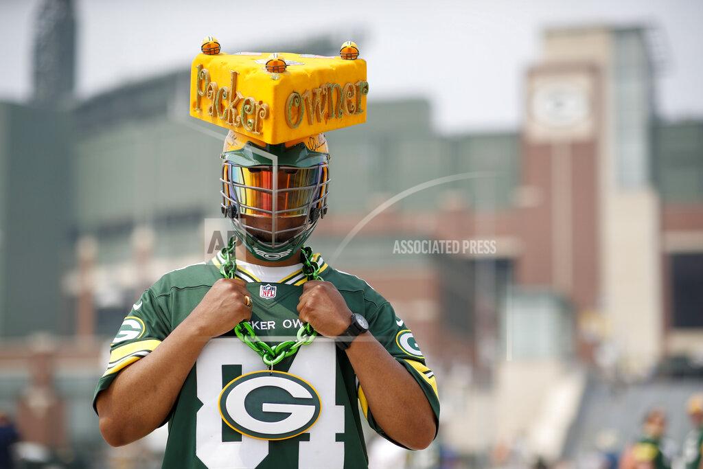 Matt Ludtke Packers' fan Bobby Anderson poses for a photo outside Lambeau Field during NFL football training camp Saturday, July 31, 2021, in Green Bay, Wis. (AP Photo/Matt Ludtke)