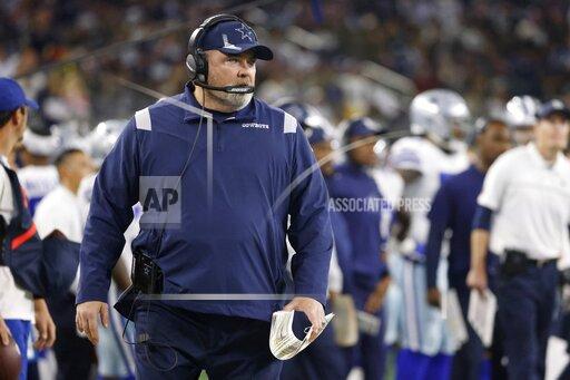 Dallas Cowboys head coach Mike McCarthy watches play against the Las Vegas Raiders in the first half of an NFL football game in Arlington, Texas, Thursday, Nov. 25, 2021. (AP Photo/Ron Jenkins)