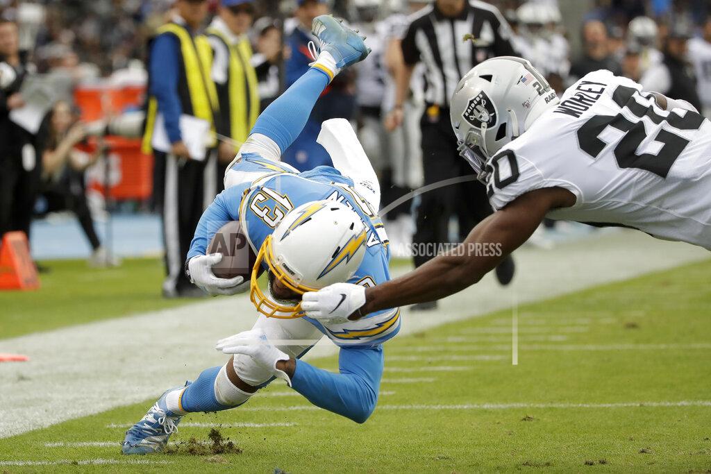 Marcio Jose Sanchez Oakland Raiders cornerback Daryl Worley, right, tackles Los Angeles Chargers wide receiver Keenan Allen short of the goal line during the second half of an NFL football game Sunday, Dec. 22, 2019, in Carson, Calif. (AP Photo/Marcio Jose Sanchez)
