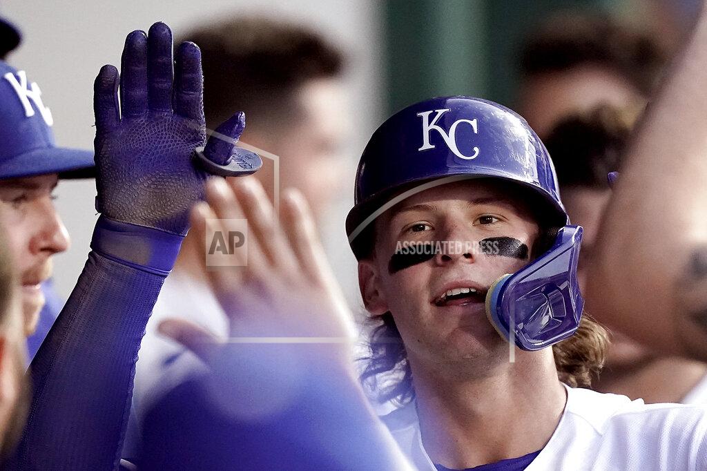 Charlie Riedel Kansas City Royals' Bobby Witt Jr. celebrates in the dugout after hitting a solo home run during the third inning of a baseball game against the Chicago White Sox Wednesday, May 18, 2022, in Kansas City, Mo. (AP Photo/Charlie Riedel)