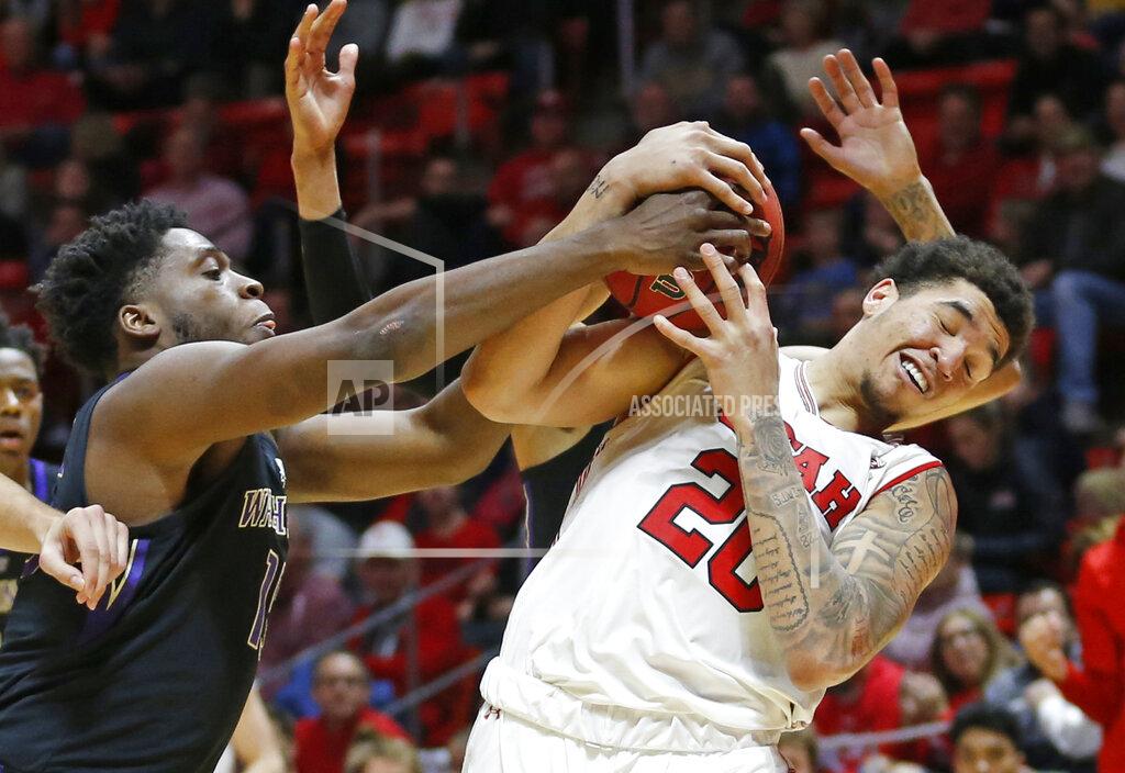 Rick Bowmer Washington forward Noah Dickerson, left, and Utah forward Timmy Allen (20) vie for a rebound during the second half of an NCAA college basketball game Thursday, Jan. 10, 2019, in Salt Lake City. (AP Photo/Rick Bowmer)