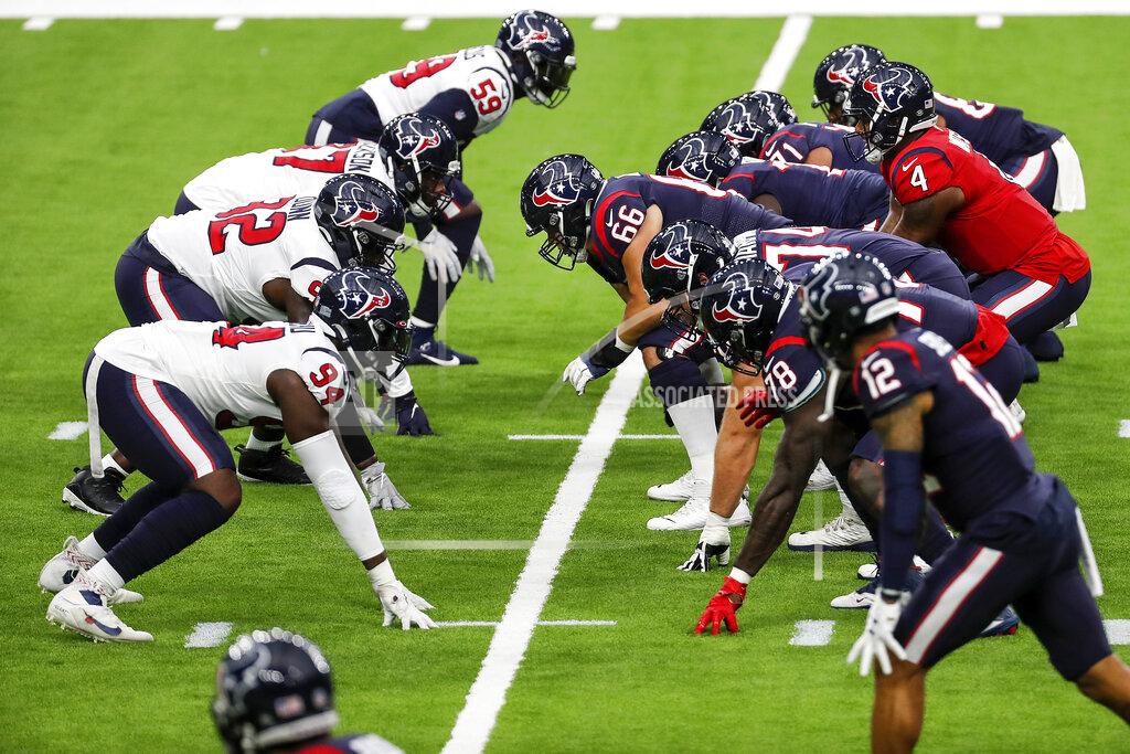 Brett Coomer Houston Texans quarterback Deshaun Watson (4) takes a snap from center Nick Martin (66) during NFL football training camp Thursday, Aug. 27, 2020, in Houston. (Brett Coomer/Houston Chronicle via AP, Pool)