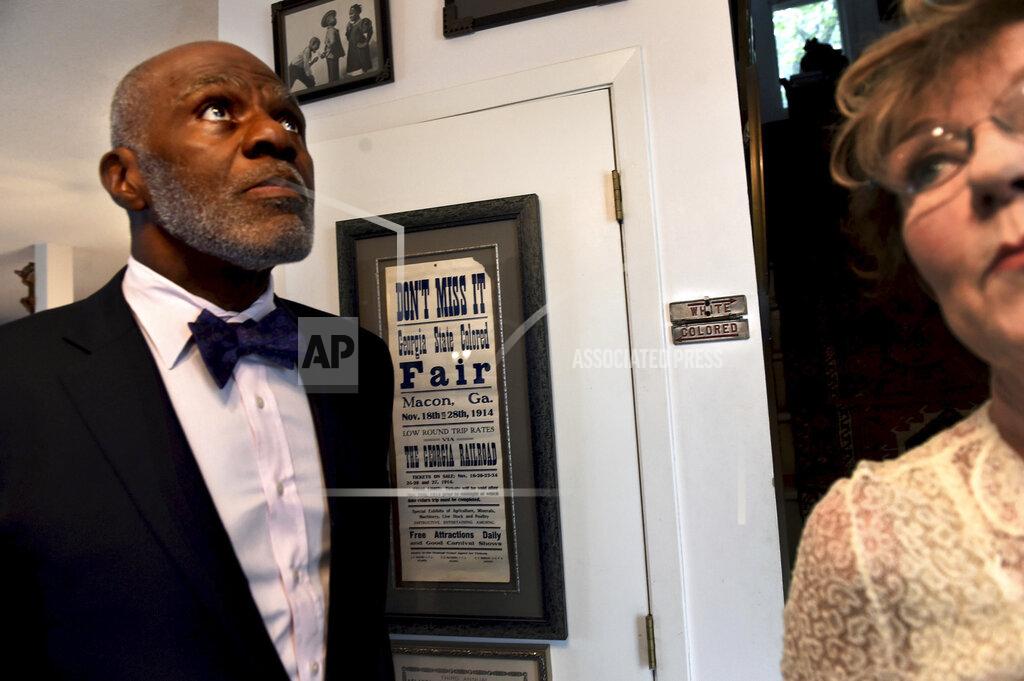 Jean Pieri File-In this Aug. 30, 2017, file photo, Alan and Diane Page show artifacts in their collection in St. Paul, Minn. Page has counted art collection among his many life pursuits, and the former Vikings star has two of his prized pieces up for sale through a New York auction house, each valued at more than $200,000. (Jean Pieri/Pioneer Press via AP, File)
