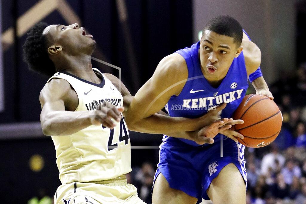 Mark Humphrey Kentucky guard Keldon Johnson collides with Vanderbilt forward Aaron Nesmith (24) in the first half of an NCAA college basketball game Tuesday, Jan. 29, 2019, in Nashville, Tenn. (AP Photo/Mark Humphrey)