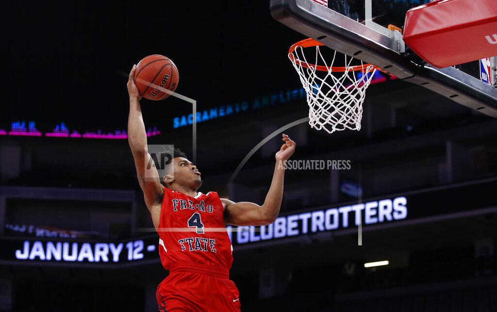 Rich Pedroncelli Fresno State's Niven Hart goes up for a dunk against Saint Mary's during the second half of an NCAA college basketball game in Sacramento, Calif., Wednesday, Nov. 20, 2019. Saint Mary's won 68-58. (AP Photo/Rich Pedroncelli)
