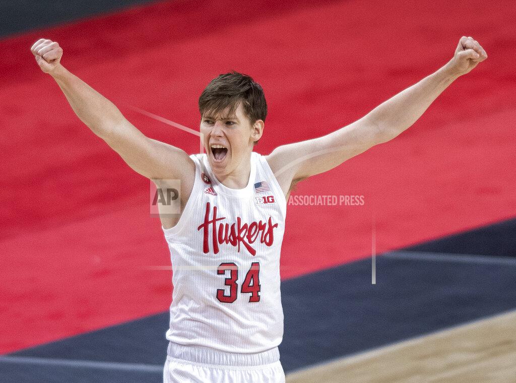 Francis Gardler Nebraska guard Thorir Thorbjarnarson (34) celebrates a three-point basket by teammate Shamiel Stevenson (4) against Illinois during the first half of an NCAA college basketball game on Friday, Feb. 12, 2021, in Lincoln, Neb. (Francis Gardler/Lincoln Journal Star via AP)