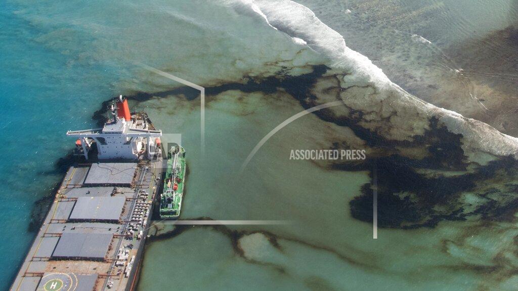 Gwendoline Defente FILE - This Tuesday, Aug. 11, 2020 photo provided by the French Army shows oil leaking from the MV Wakashio, a bulk carrier ship that ran aground on a coral reef off the southeast coast of Mauritius. A decade-long effort by the world to save the world’s disappearing species and declining ecosystems has mostly failed so far, with fragile ecosystems like coral reefs and tropical forests in even more trouble than ever, according to a United Nations biodiversity report released on Tuesday, Sept. 15, 2020. (Gwendoline Defente/EMAE via AP)